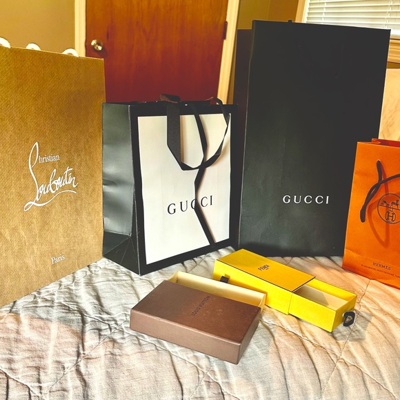 4 designer gift bags and two designer slide gift boxes. - Picture 1 of 7